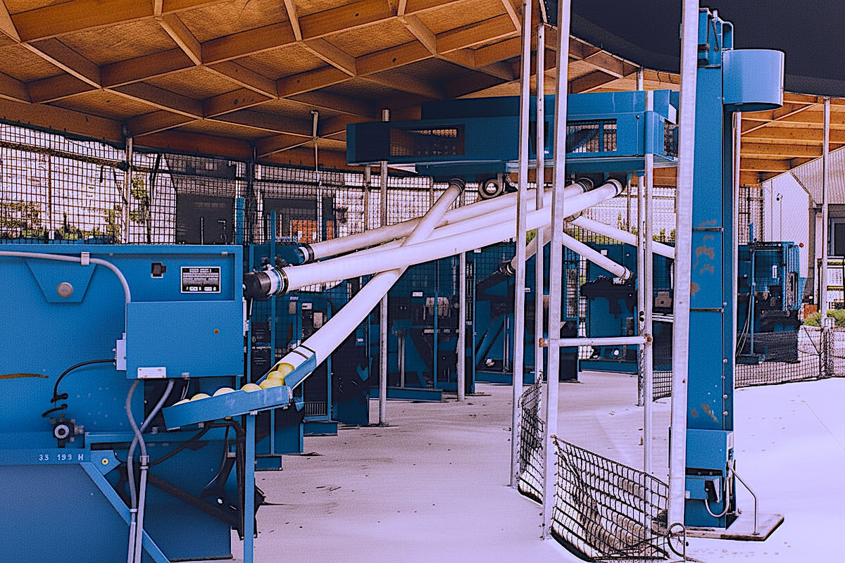 Central Hopper Distribution System – Master Pitching Machine
